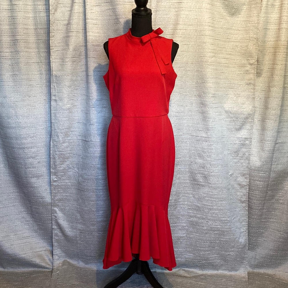 Size 10. Red. Mid length dress. Only wore a few times.